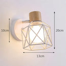 Industrial iron cage wall light bedroom black metal sconce by Decorbites