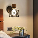 Industrial iron cage wall light bedroom black metal sconce by Decorbites