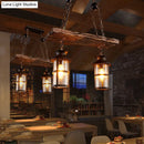 DecorBites™ Industrial Lantern Pendant Light with Clear Glass, Wood Decoration, and Cage Design - 2/3 Lights - Black