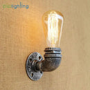 Industrial steampunk loft pipe wall lamp black & aged brass bedroom by Decorbites