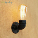 Industrial steampunk loft pipe wall lamp black & aged brass bedroom by Decorbites