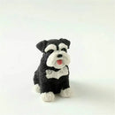 Lifelike black & white resin dog sculpture living room decor by Decorbites