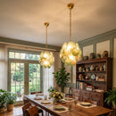 Liora Swirl Disc Green Glass Chandelier