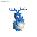 GobekUsa Loft Style Wall Mounted Sconce with Clear Crystal Shade, Blue/Gold Finish and Deer Head Accent