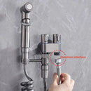 Matte black bidet spray set with coiled hose for bathroom by Decorbites