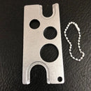 Metallic multi color essential oils opener tool for kitchen storage by Decorbites
