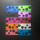 Metallic multi color essential oils opener tool for kitchen storage by Decorbites