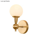 GobekUsa Brass Orb Wall Mount Light with Opal Glass Lampshade - Mid Century Wall Lighting Idea