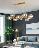 GobekUsa Mid-Century Gold Island Pendant Light - 8 Lights, Spherical Glass, Perfect for Dining Table