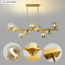 GobekUsa Mid-Century Modern Gold Metal Pendant with Spherical Amber Glass - Island Ceiling Light for Dining Table
