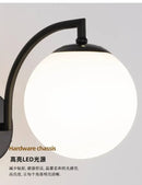 Minimalist black & gold glass ball wall light bedroom sconce by Decorbites
