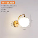 Minimalist black & gold glass ball wall light bedroom sconce by Decorbites