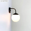 GobekUsa Minimalist Golden/Black Wall Sconce Light with Milky Glass Ball Shade - 1-Bulb Bedside Lamp