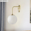 GobekUsa Minimalist Golden/Black Wall Sconce Light with Milky Glass Ball Shade - 1-Bulb Bedside Lamp