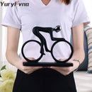 Minimalist black & silver cyclist sculpture figurine living room decor by Decorbites