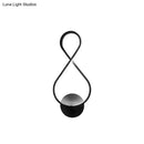 GobekUsa 8-Shaped Acrylic LED Wall Sconce in Black/White - Warm/White Lighting