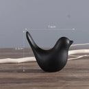 Minimalist black & white ceramic bird figurine set living room decor by Decorbites