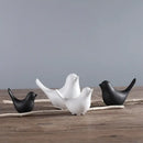 Minimalist black & white ceramic bird figurine set living room decor by Decorbites