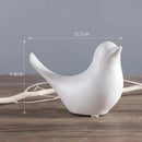 Minimalist black & white ceramic bird figurine set living room decor by Decorbites