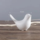 Minimalist black & white ceramic bird figurine set living room decor by Decorbites