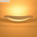 GobekUsa Modern Black/White Curved Shade LED Wall Sconce - Stylish Aluminum Lamp for Bedroom