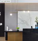 GobekUsa Minimalist Metal Pendant Lighting with Gold Accents - Modern Globe Glass Island Ceiling Light for Living Room
