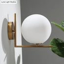 GobekUsa Opaline Glass Ball Wall Lamp with Right Angle Arm in Brass - Minimalist & Elegant