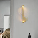 GobekUsa Minimalistic Brass Curve LED Wall Mount Light: Stylish Metal Sconce for Living Room