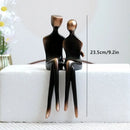 Minimalist bronze & black resin couple sculptures bedroom decor by Decorbites