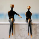 Minimalist bronze & black resin couple sculptures bedroom decor by Decorbites