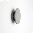 GobekUsa Minimalistic Cement Grey LED Wall Sconce Light for Bedside - Flat Round Wall Mount