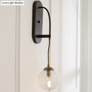 GobekUsa Minimalist Clear Glass Wall Sconce with 1 Light - Black Wall Mounted Fixture