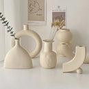 Minimalist cream ceramic art vase living room sculptural decor by Decorbites