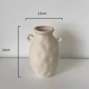 Minimalist cream ceramic art vase living room sculptural decor by Decorbites