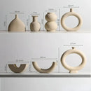 Minimalist cream ceramic art vase living room sculptural decor by Decorbites