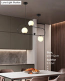 GobekUsa Minimalist Ellipse Pendant Light: Modern Glass Globe Ceiling Fixture for Living Room Island