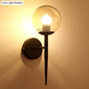 GobekUsa Clear Glass Mini Sphere Wall Lamp - Minimalist Living Room Sconce with Pencil Arm in Black/Gold
