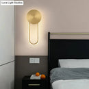 GobekUsa Sleek Brass LED Wall Sconce Light for Bedside – Simple Elliptical Metal Lamp Fixture