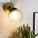 GobekUsa Minimalist 1-Light Gold Wall Sconce: Exposed Ball Design for Living Room, Water Glass Feature