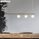 GobekUsa Golden Glass Shade Hanging Lamp: Post Modern Bubble Chandelier for Dining Room