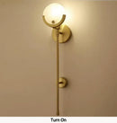 Minimalist golden marble wall lamp for bedroom and living room by Decorbites