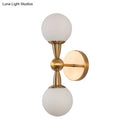 GobekUsa Minimalist Hand-Blown Glass Spherical Wall Sconce with Half-Bulb in Gold - Perfect for Bedrooms
