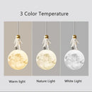 Minimalist white astronaut pendant light for children’s bedroom by Decorbites
