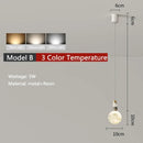 Minimalist white astronaut pendant light for children’s bedroom by Decorbites