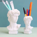 Minimalist white david portrait resin sculpture living room decor by Decorbites