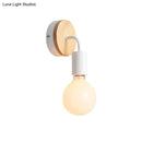 Minimalist white metal and wood bare bulb wall sconce bedroom light by Decorbites