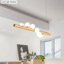 GobekUsa Minimalist Wooden Island Pendant with Glass Sphere for Living Room Ceiling Lighting