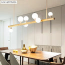 GobekUsa Minimalist Wood Island Pendant Light with Opal Glass Balls - perfect for Restaurants