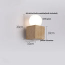 GobekUsa LED Wall Light: Nordic Modern Design with White Glass & Yellow Travertine Wood