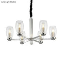 GobekUsa Modern 6-Head Clear Glass Candle Chandelier: Chrome Ceiling Pendant Fixture with Adjustable Chain